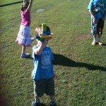 Grasslad showing off his latest imvemption Turfgirl taking sometime out to practice her cartwheels on the green couch